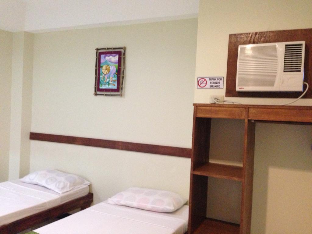 Qm Pension House Тагбиларан Сити Стая снимка