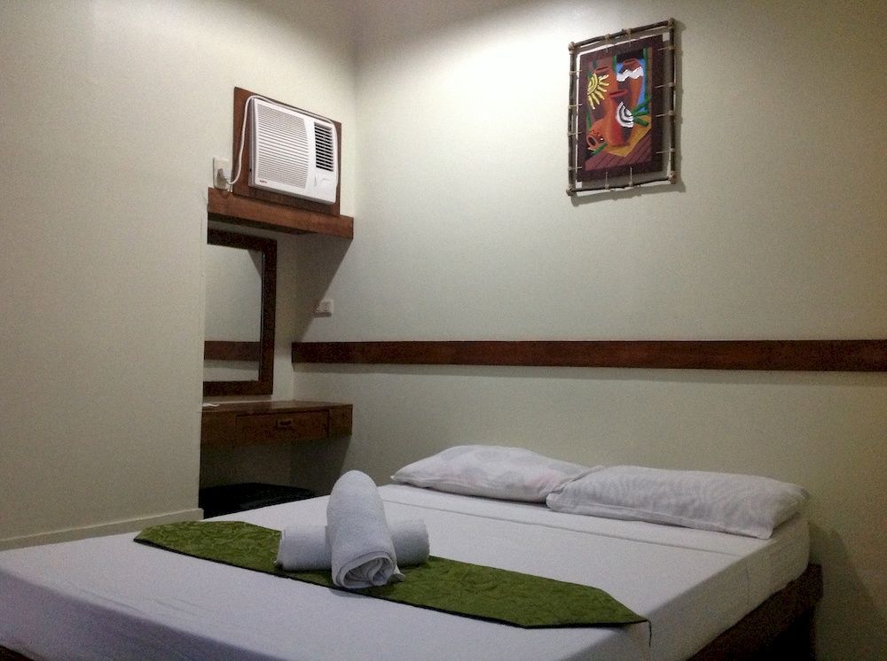 Qm Pension House Тагбиларан Сити Екстериор снимка