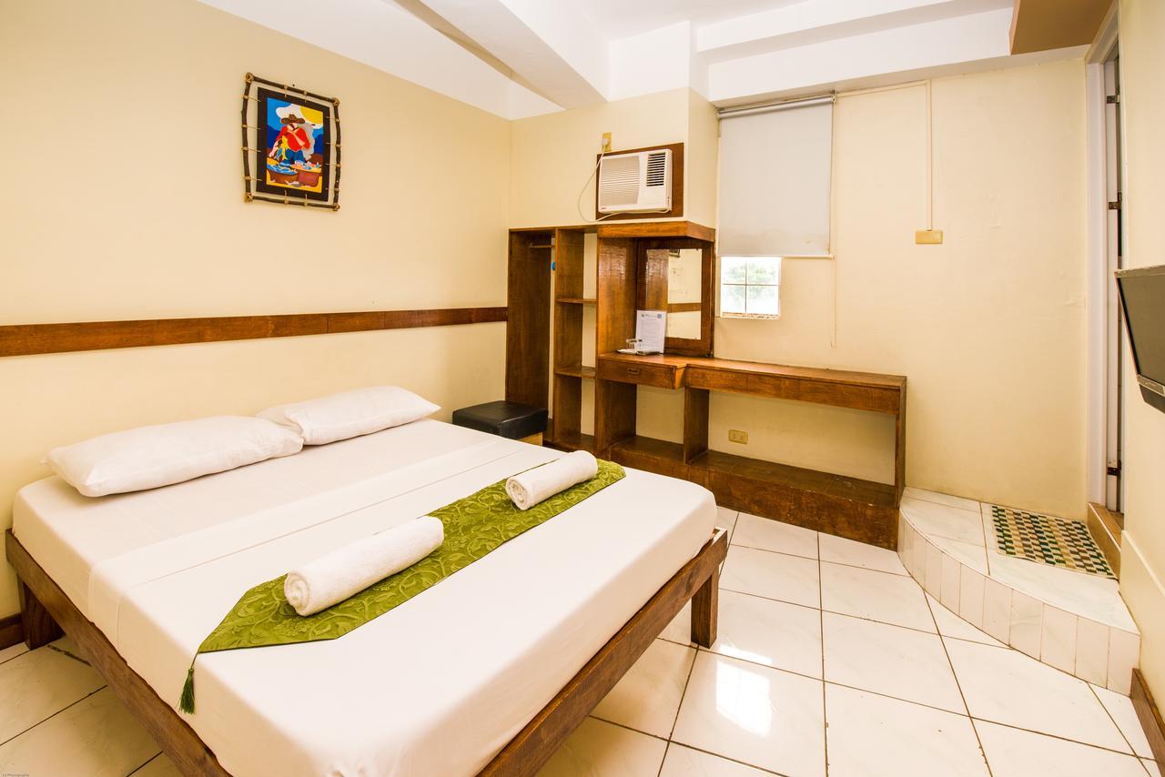 Qm Pension House Тагбиларан Сити Екстериор снимка
